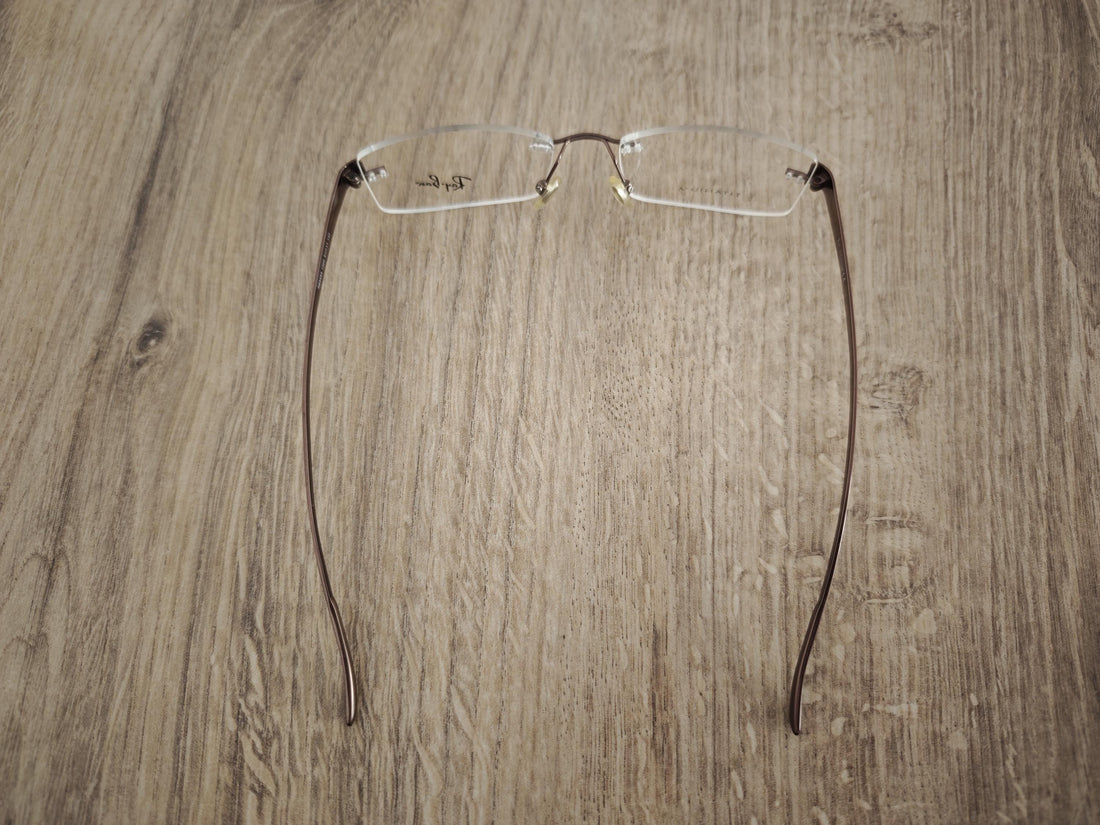Ray-Ban RB8583 Rimless Titanium Eyeglasses Frames - Metallic Brown - NOS